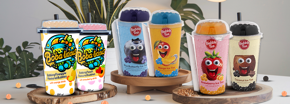 Bobalicious and Bubble Tea drinks showcasing a variety of refreshing flavours with vibrant packaging on a stylish table setup.